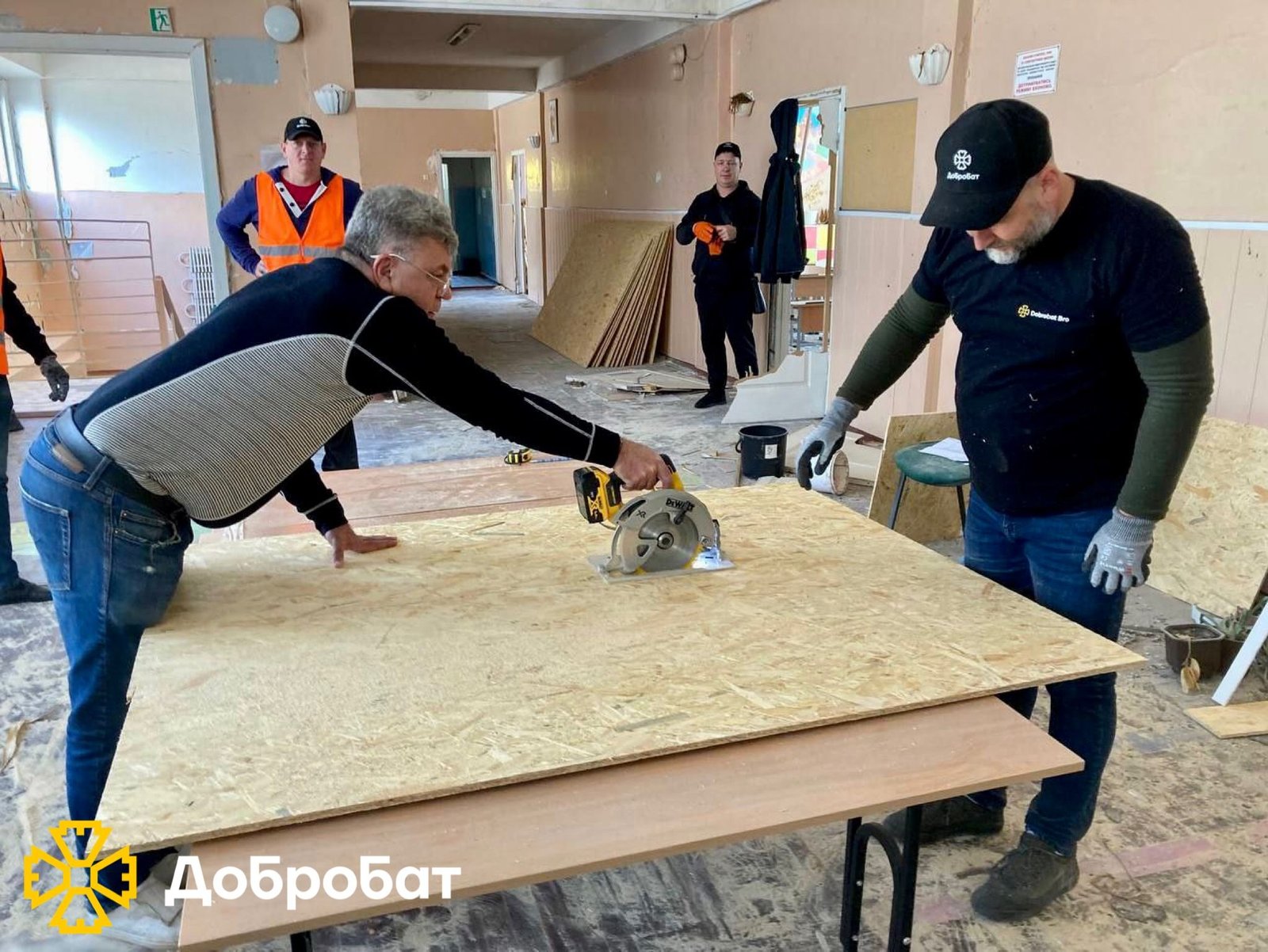 Volunteer construction battalion holds the reconstruction frontline: about 300 volunteers joined to help at the sites